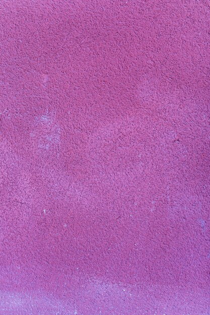 Coarse purple concrete surface