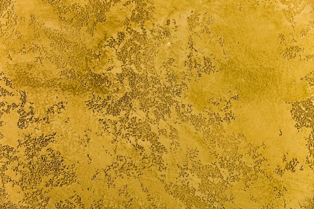 Free photo coarse yellow cement wall surface