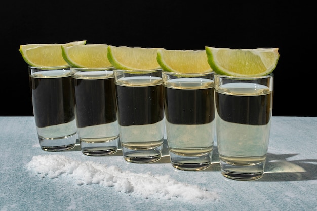 Cocktail glasses with lime slices