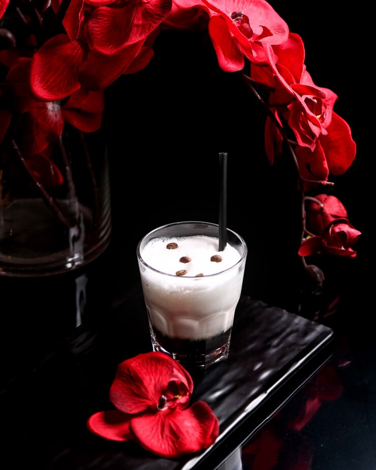 Free Photo cocktail with foam and coffee beans