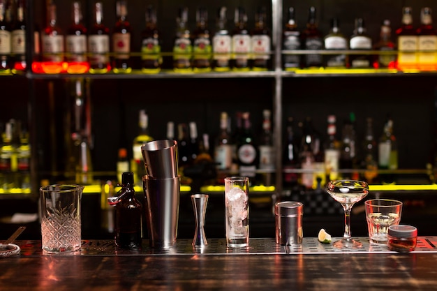 Cocktails and shaker arrangement in a night club