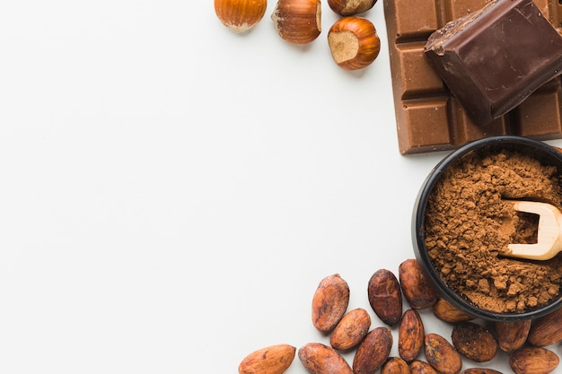 Cocoa beans and chestnuts copy space
