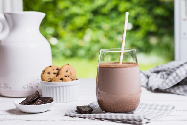 Cocoa in glass on table