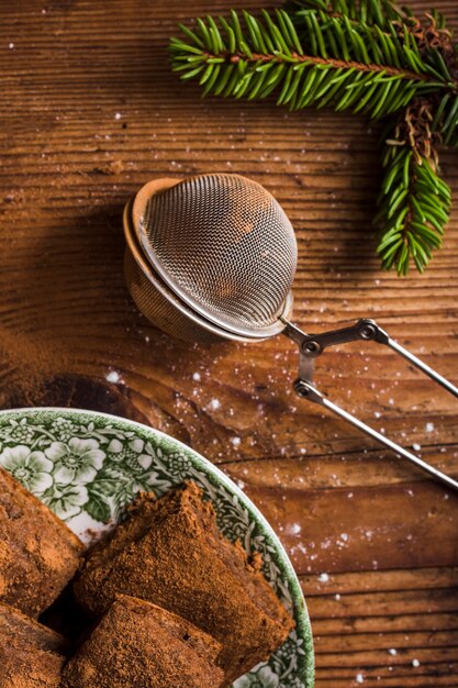 Cocoa powder and strainer flat lay