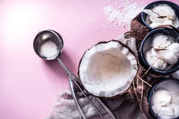 Free photo coconut ice cream on a pink background