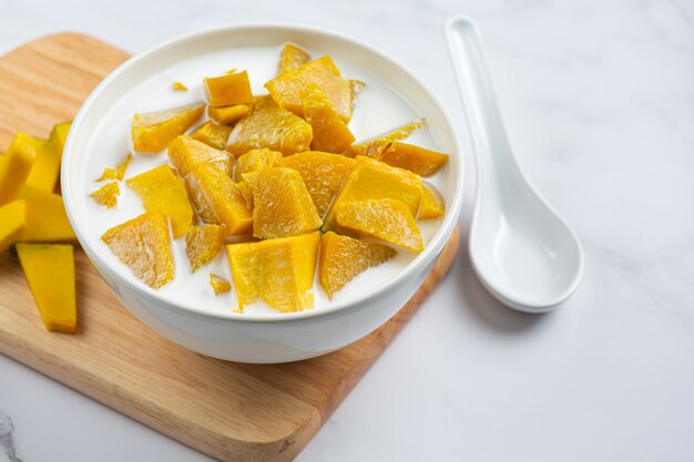 Coconut Milk Stewed Pumpkin in white bowl