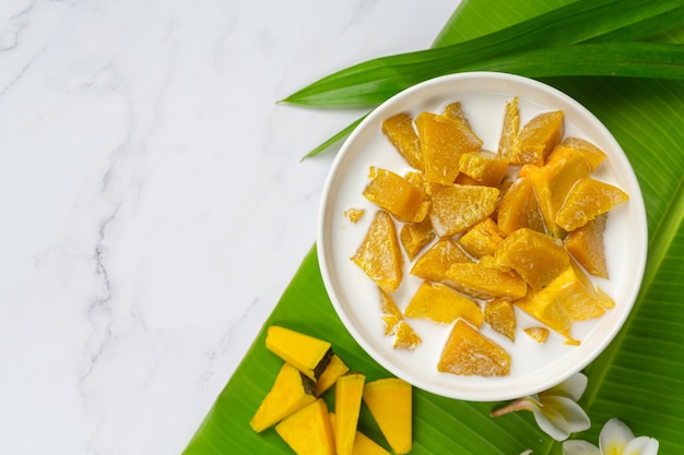 Coconut Milk Stewed Pumpkin in white bowl