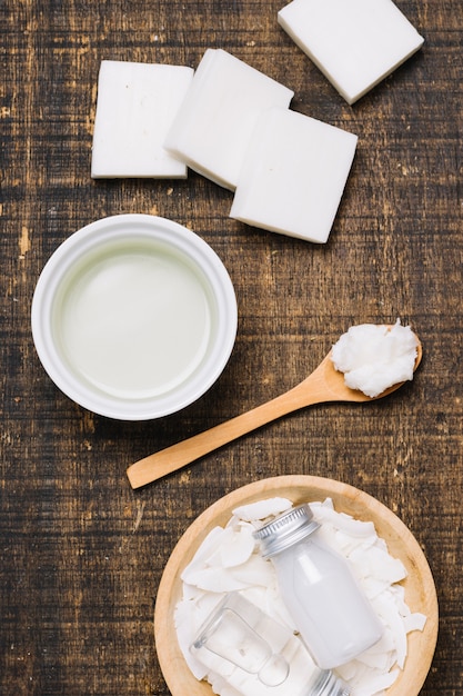 Coconut oil with soap bars bright top view