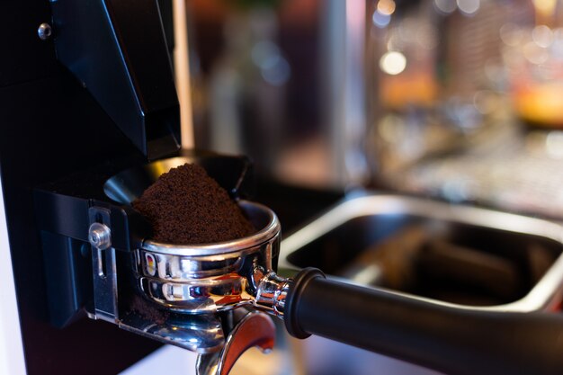 Coffe grinder in cafe.