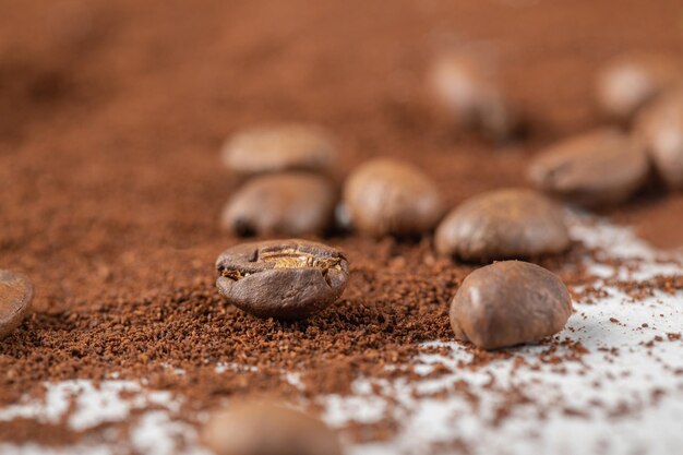 Coffee beans on blended coffee or cocoa powder.