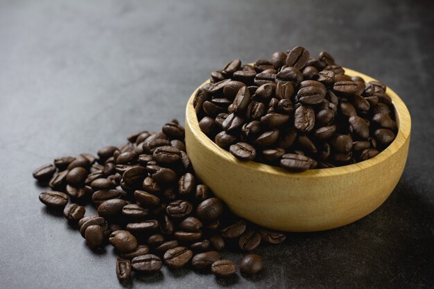 Coffee beans in in bowl on table