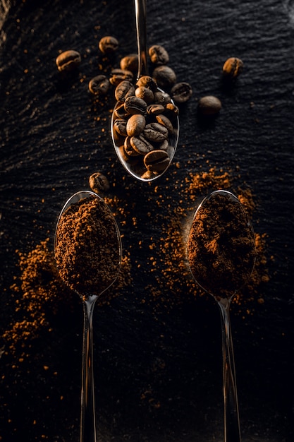 Coffee beans grained on a spoon