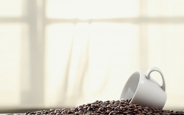 Free photo coffee beans in a mug