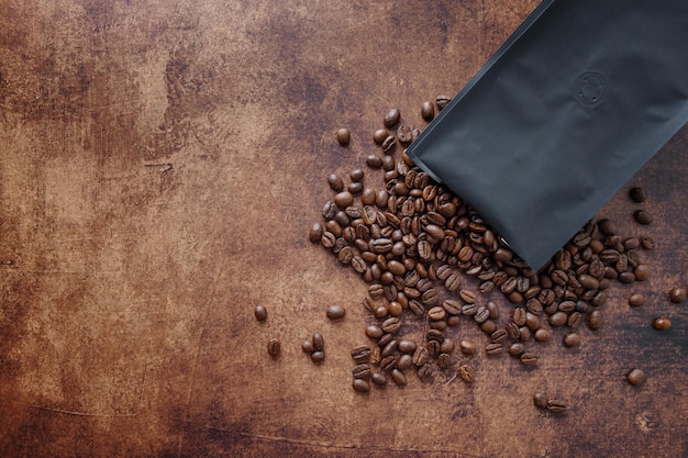 Coffee beans on wooden old background