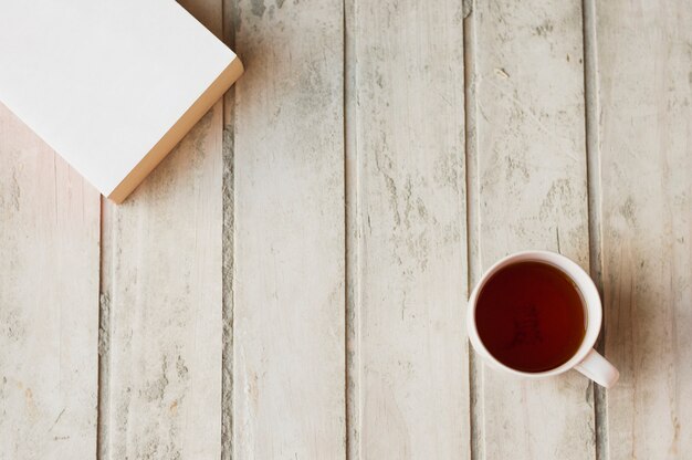 Coffee and book on table