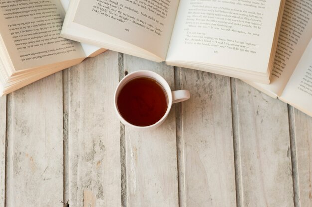 Coffee and books on table