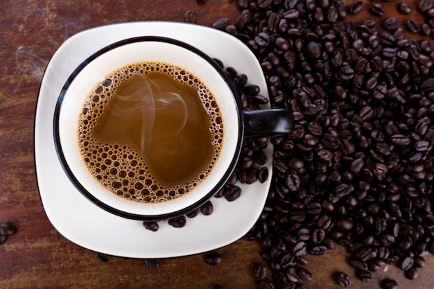 Coffee cup and beans