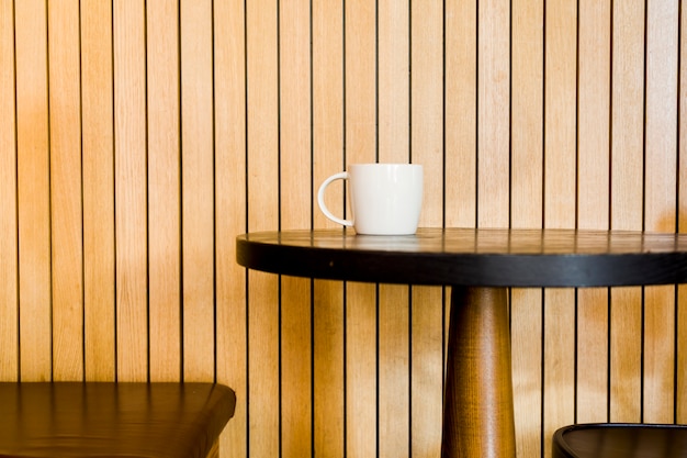 Free photo coffee cup in a table