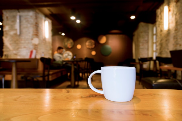 Coffee cup with blurred background