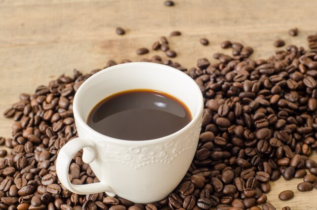 coffee cup with coffee beans