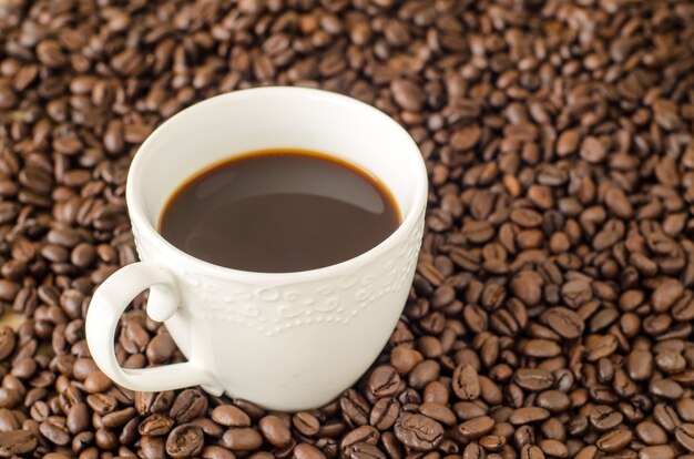 coffee cup with coffee beans