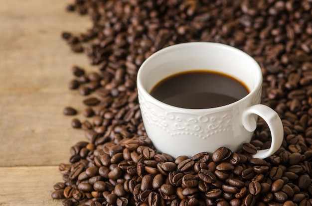 coffee cup with coffee beans