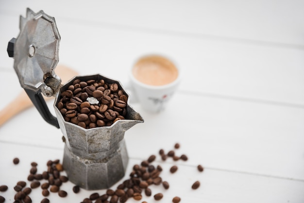 Coffee maker full of coffee grains