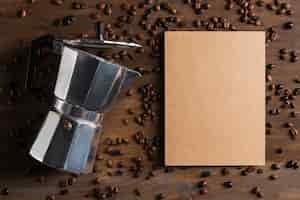 Free photo coffee maker and package near beans