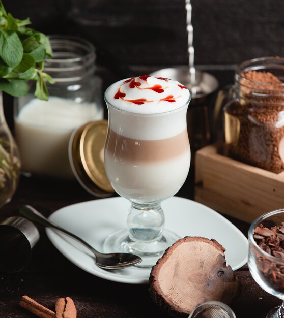 Coffee milk latte with strawberry slices