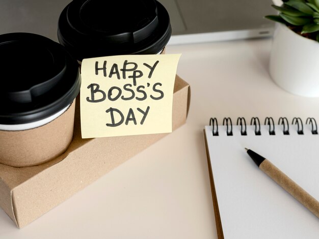 Coffee with sticky note message happy boss dat