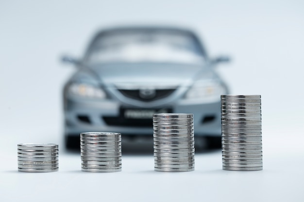 coin stacks in front of car