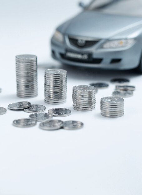 coin stacks in front of car