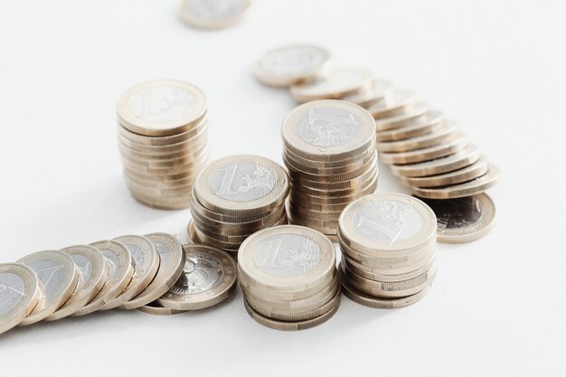 Coins on wooden table