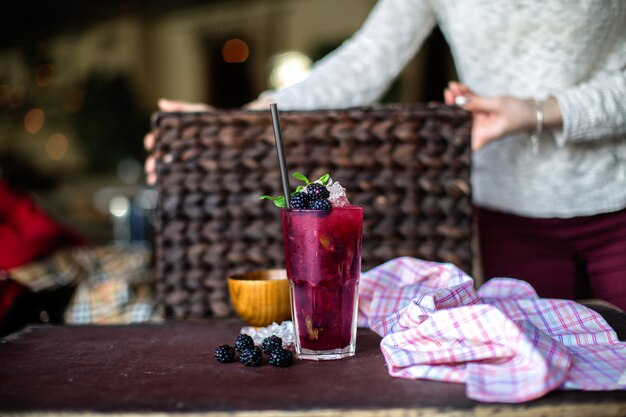 Cold berry cocktail on the table