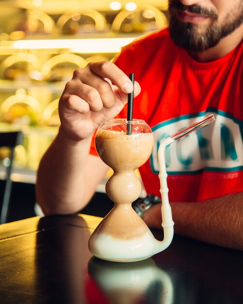 Cold chocolate with milk on the table