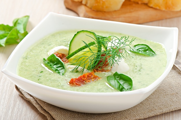 Cold cucumber soup with dried tomatoes and mozzarella