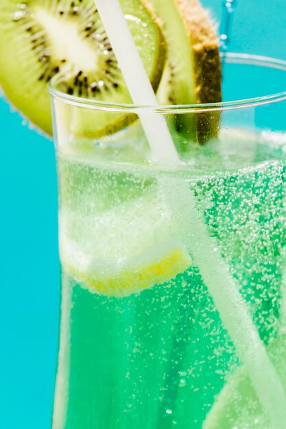 Cold exotic green summer cocktail with kiwi and lemon