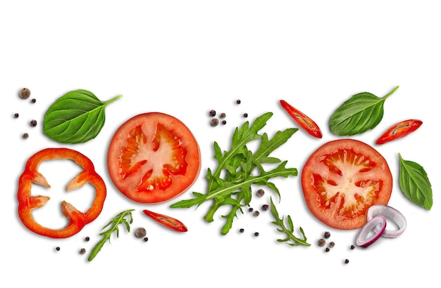 Collage of green leaves of arugula and basil, sliced red spicy and bell pepper, onion and tomatoes, black pepper peas are isolated on white background. Cooking concept. Close up, copy space