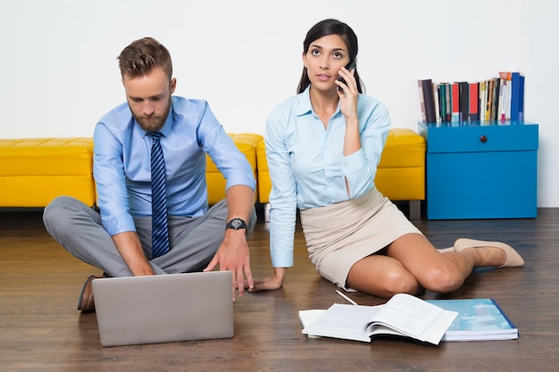 colleague woman sitting mess man