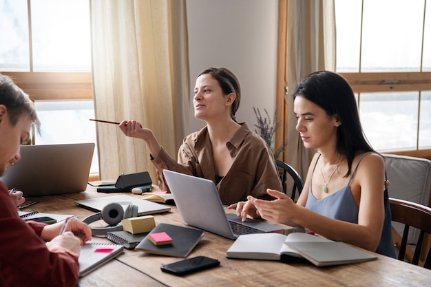 Colleagues discussing during study session