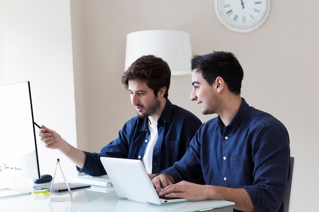 Colleagues discussing work project