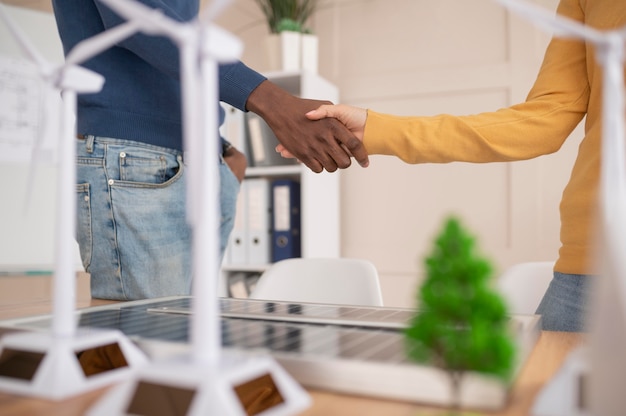 Colleagues handshake close up