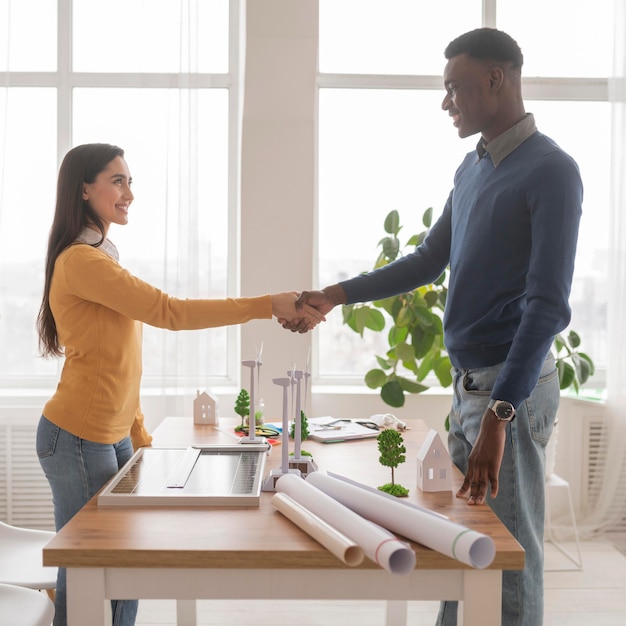 Colleagues handshake for teamwork project success