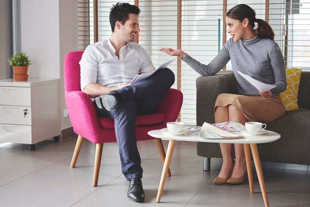 Colleagues having business meeting at work