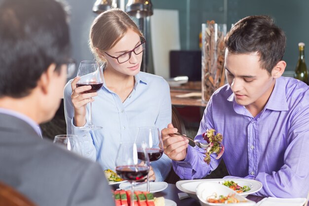 Colleagues Having Dinner in Restaurant