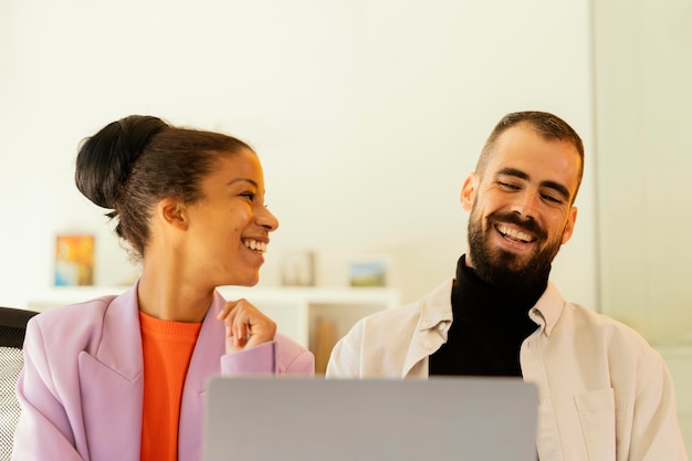 Free photo colleagues having an online meeting for work