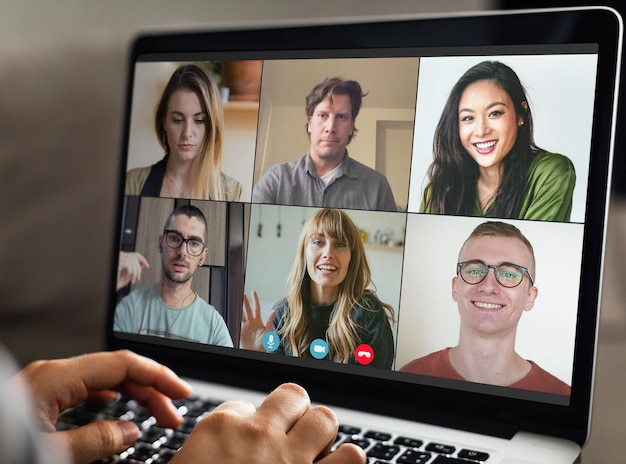 Free photo colleagues having a video conference during the coronavirus pandemic