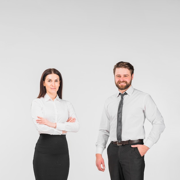 Colleagues male and female standing together 