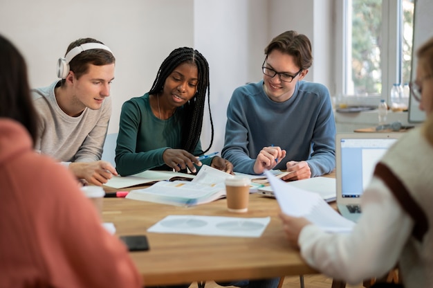 Colleagues studying together during group study