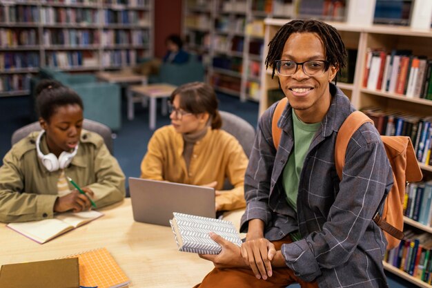 Colleagues studying together in the university library